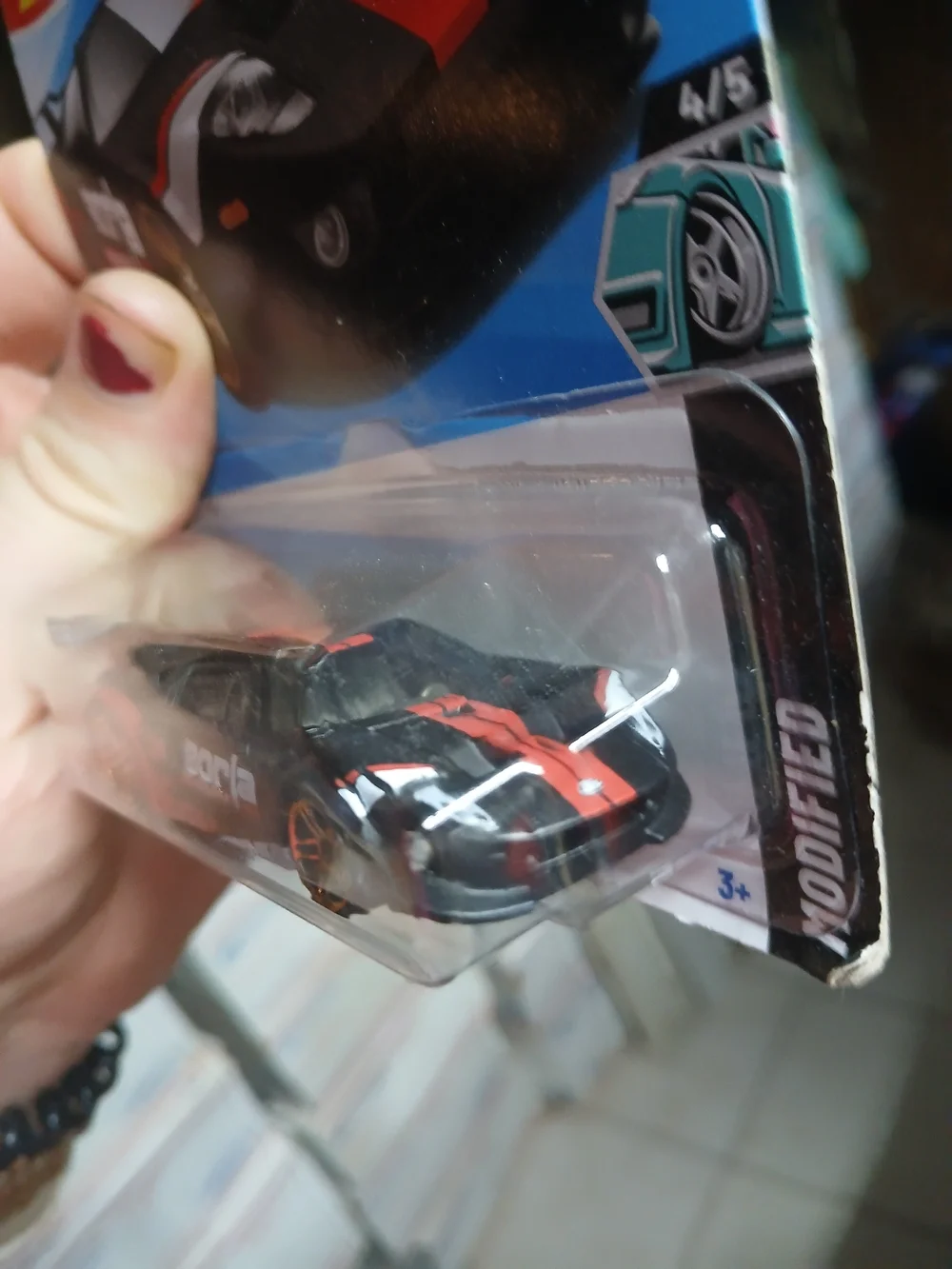 the Hot Wheels Ford GT (159/250) in black with red and white accents